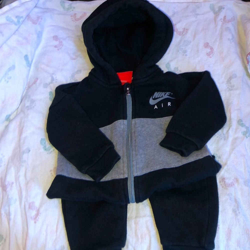 Black and grey Nike one piece